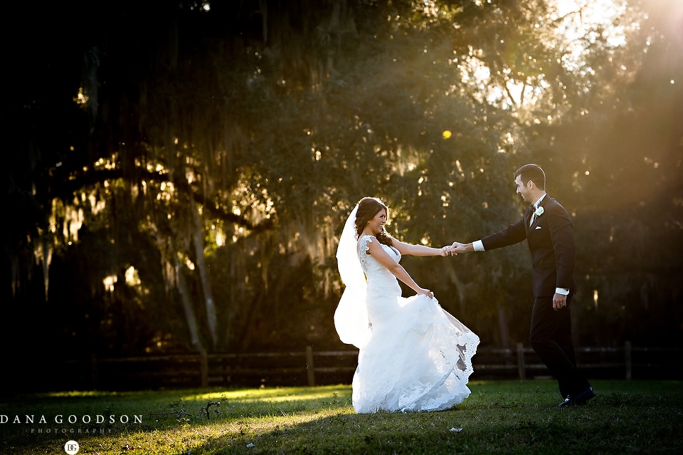 Pebble Hill Plantation Wedding Sunset with playful Bride and Groom by Dana Goodson Photography