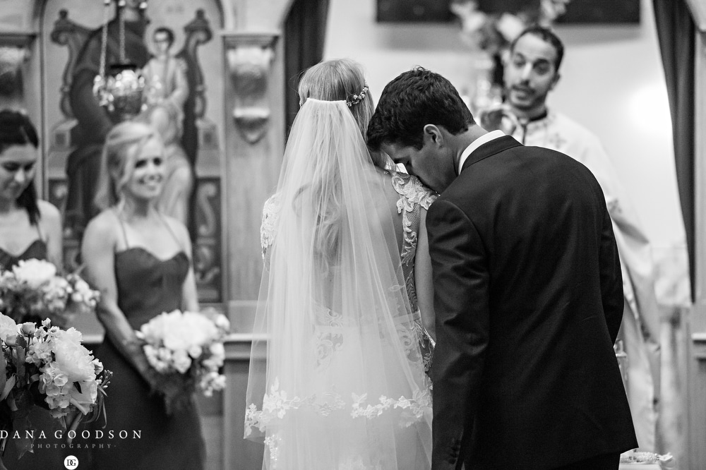 St Augustine Wedding Photographer captures candid moment with bride and groom at Greek Orthodox Wedding in St Augustine