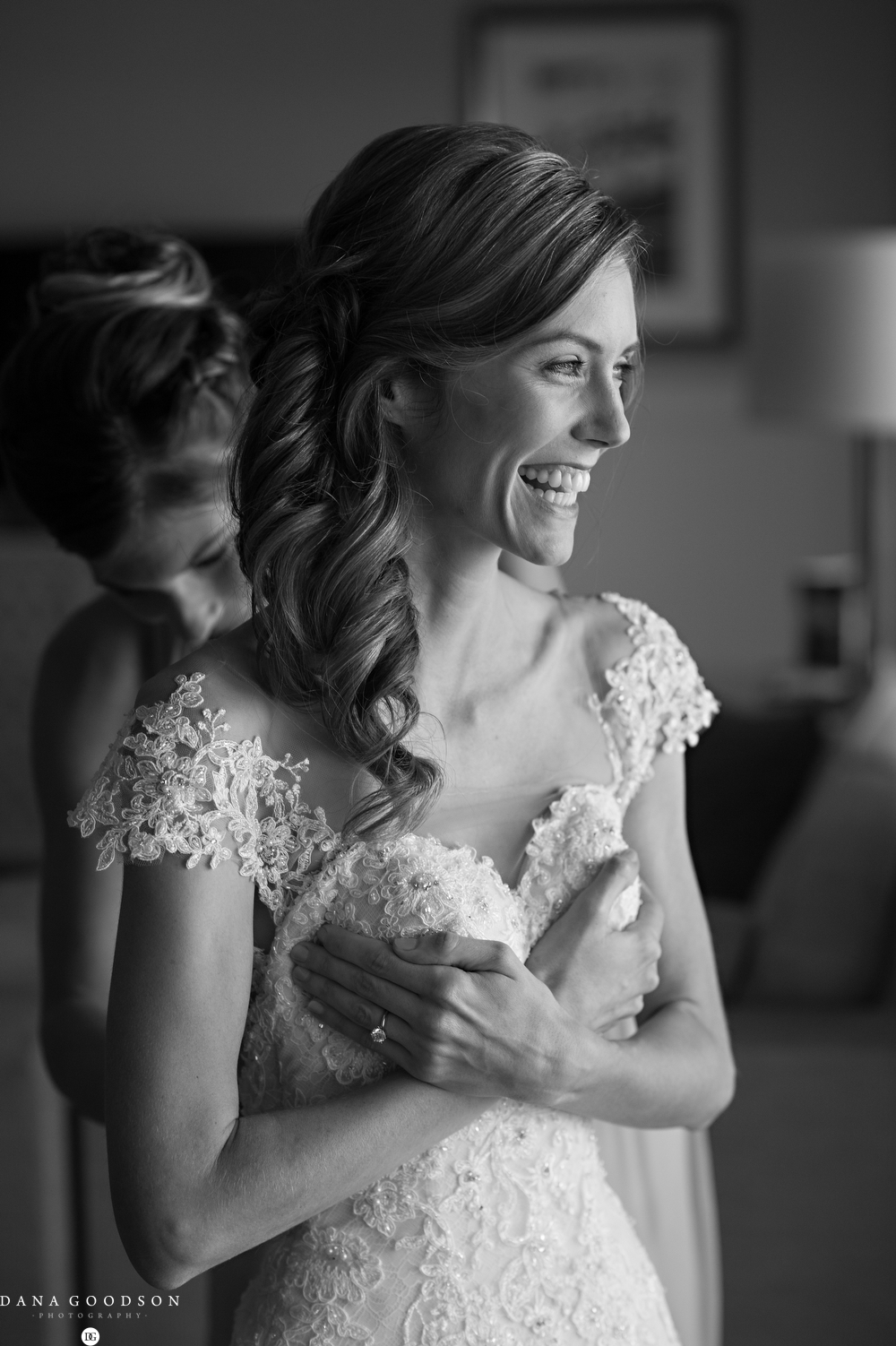 Black and white photo of bride getting ready in Amelia Island wedding
